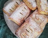 Foto del passaggio 2 della ricetta Saccottini di sfoglia con Nutella e banane