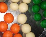 A picture of step 6 of Tricolour suji coconut laddu.