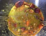 Foto del paso 4 de la receta Merluza en salsa de zanahoria y almendra con curry
