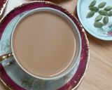 A picture of step 7 of Ginger Cardamom Tea.