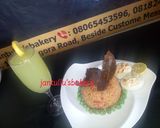 A picture of step 4 of Maggi signature jallof rice.