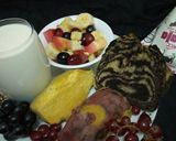 A picture of step 7 of Fruit salad, zebra cake, sweet potatoe and fermented milk(mala).