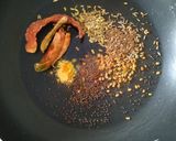 A picture of step 1 of Aachari Bhindi.
