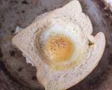 Egg in a hole sandwich recipe step 1 photo