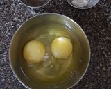 A picture of step 1 of European omelet with brown bread.