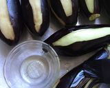 A picture of step 3 of Karniyarik (Stuffed eggplant).