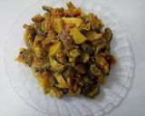 A picture of step 6 of Khate meethe aloo karele.