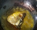 A picture of step 3 of Maacher Matha'r Ghonto/Fish Head Curry.
