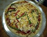 A picture of step 7 of Chicken pizza#festive contest Nairobi#authors marathon.