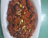 A picture of step 8 of Gajar ka halwa with peels.