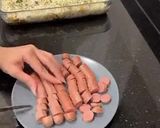 صورة لخطوة 2 من وصفة ساندويتش حمسة النقانق 🌭🔥