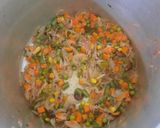 A picture of step 3 of Veg pulao in pressure cooker Indian recipe.