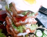 A picture of step 11 of Delicious tower sandwich.