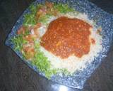 Rice and stew with lettuce salad
