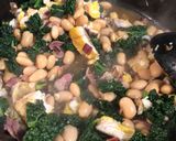 A picture of step 5 of Smoked haddock, kale and butterbean baked eggs.