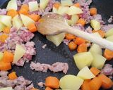 A picture of step 2 of My Gran's sausage and veg pie.