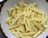 A picture of step 1 of Masala fries 🍟.