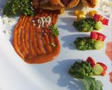 A picture of step 10 of Burrito with pea guacamole & marinara sauce.