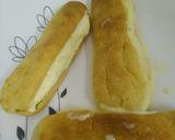 A picture of step 11 of Choco orange eclair with fresh cream...cup of hot chocolate.