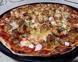 A picture of step 1 of Chicken Tikka pizza.