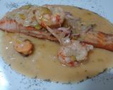 Foto del paso 7 de la receta: Salmón en salsa de naranja y marisco