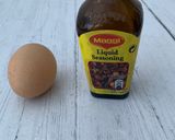 A picture of step 1 of Thai style egg noodles stir-fry served with fried egg.