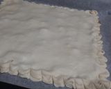 Foto del paso 6 de la receta: Coca de hojaldre rellena de chocolate y crocanti de almendra
