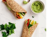 A picture of step 4 of Spinach Hummus Wrap.