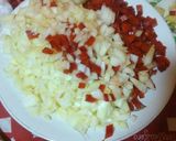 Foto del paso 2 de la receta: Zapallitos rellenos con arroz frito