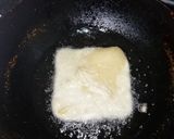 A picture of step 4 of Madakku pathiri(folded roti).