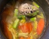 A picture of step 1 of Salmon Head Soup with Asparagus.