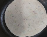 A picture of step 4 of Potato paratha with onion raita.