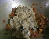 A picture of step 10 of Baingan bharta (smoked eggplant with spices).