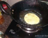 A picture of step 7 of Rice flour poori.