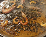 Foto del paso 5 de la receta: Arroz negro a leña
