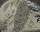 A picture of step 1 of Jau or Bajri Flour Khichu.