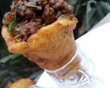 A picture of step 12 of Plantain stuffed cones.