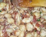 A picture of step 12 of Chicken Masala Pasta.