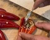 A picture of step 7 of Stuffed red chilli pickle.