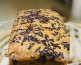 A picture of step 3 of Banana bread with shredded chocolate on top.