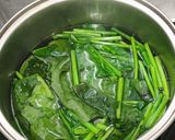 A picture of step 2 of Spinach with goji berry.