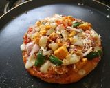 A picture of step 10 of Paneer Naan Pizza.