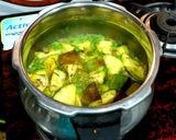 A picture of step 1 of Baingan Vatana Curry.