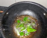 A picture of step 4 of Chicken vadaga curry.