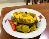 Hình bước làm 4 của món Trắm kho dưa nghệ