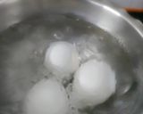 A picture of step 1 of Egg spinach curry.