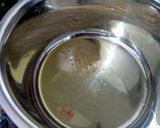 A picture of step 1 of Potato-Brinjal Curry.