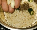 A picture of step 3 of Authentic Rickwach with Urad Dal and Colocasia leaves.