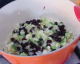 A picture of step 6 of Roast boneless chicken with chestnut, cranberry, apple, brown rice and rum stuffing.