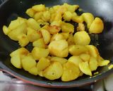 A picture of step 1 of Rasila Dahi Aloo.